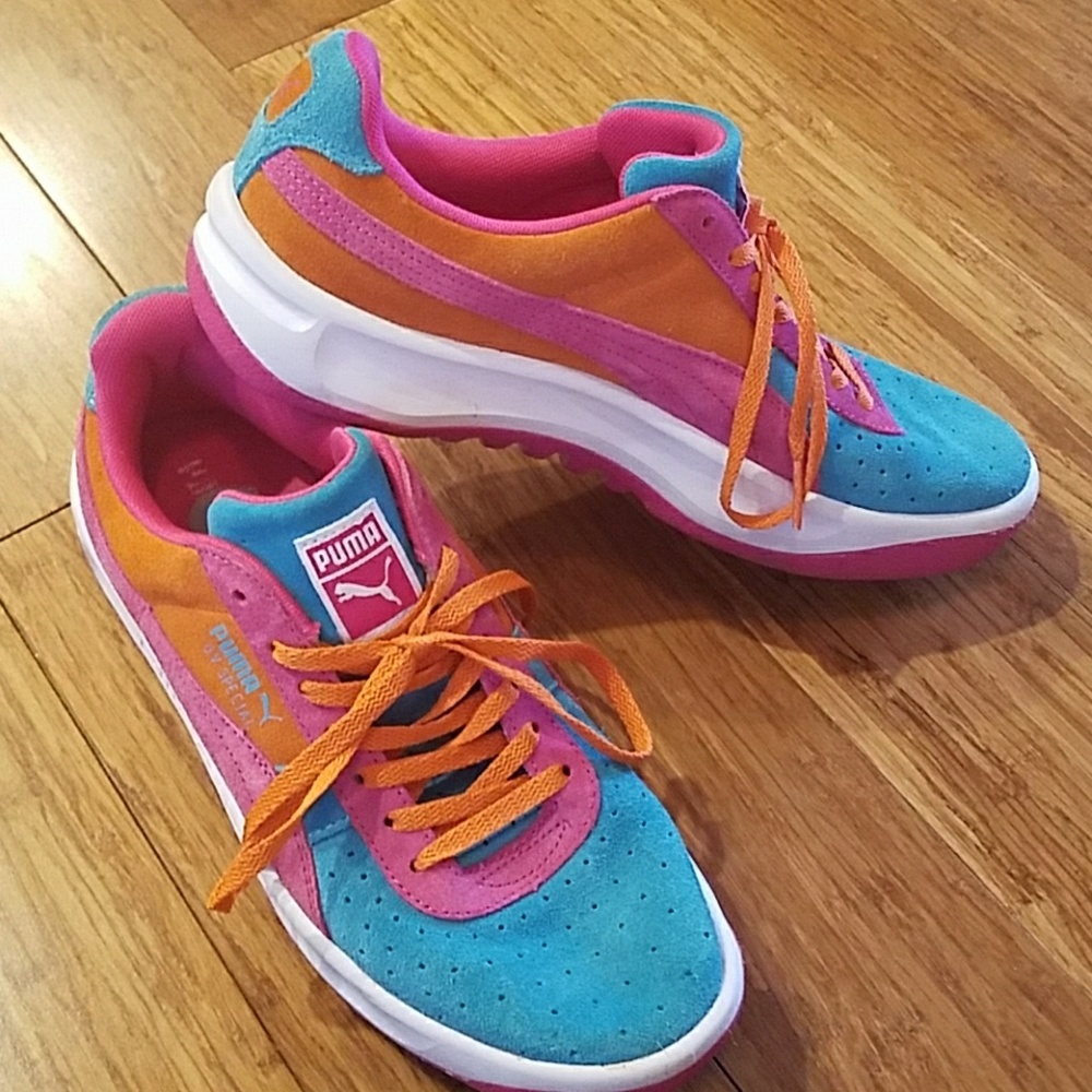 Puma suede tennis shoes.